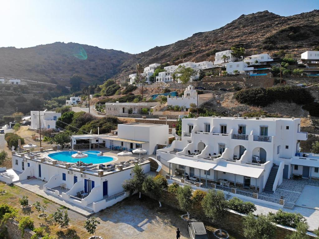 an aerial view of a villa with a swimming pool at Holidays In Ios in Mylopotas