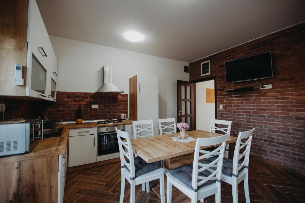 Kuchyň nebo kuchyňský kout v ubytování Apartman Vejama