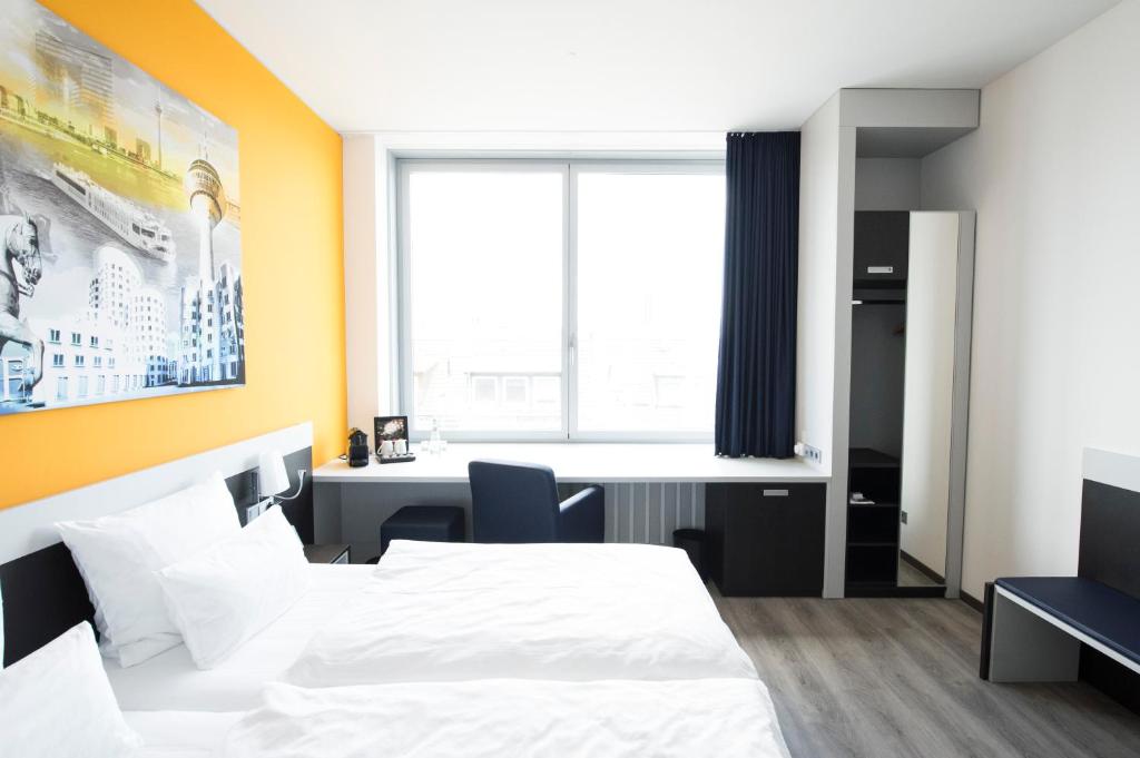Carathotel Düsseldorf City - Resim 15