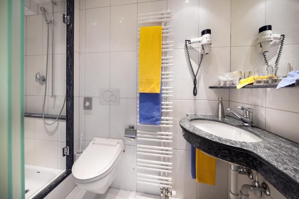 Koupelna v ubytování Hotel Gspan