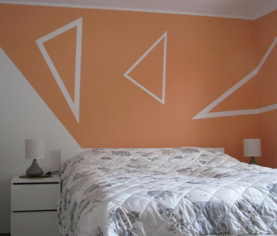 מיטה או מיטות בחדר ב-Apartma Juha -