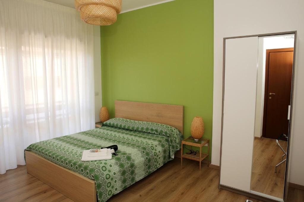 Posteľ alebo postele v izbe v ubytovaní Tosca B&B