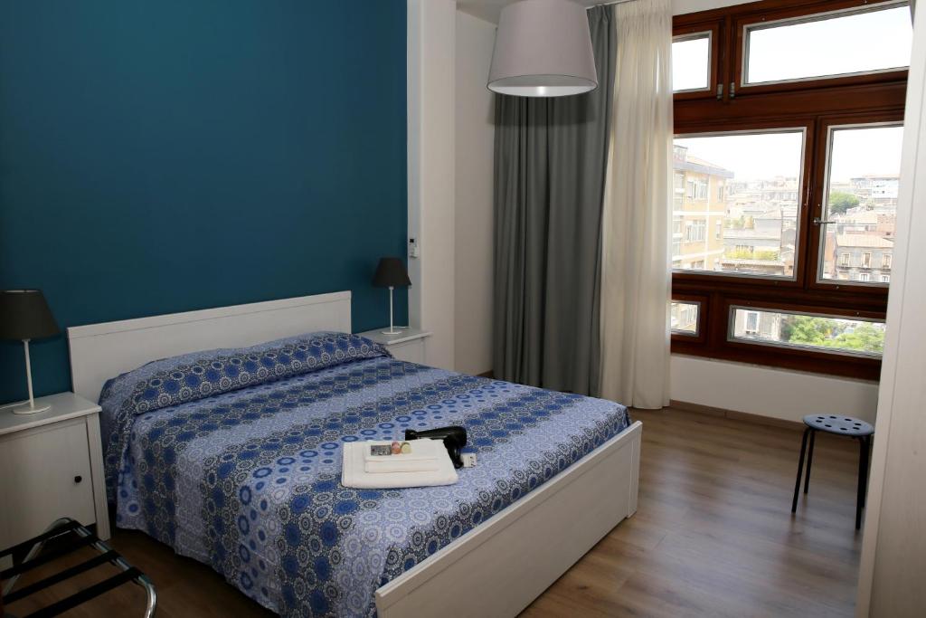 Posteľ alebo postele v izbe v ubytovaní Tosca B&B