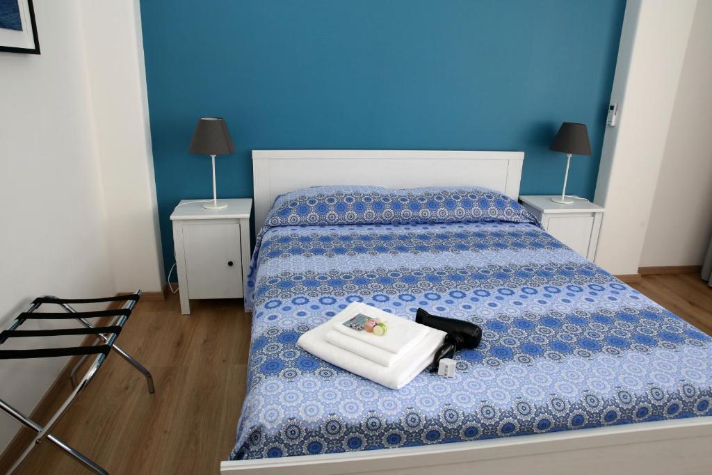 Posteľ alebo postele v izbe v ubytovaní Tosca B&B