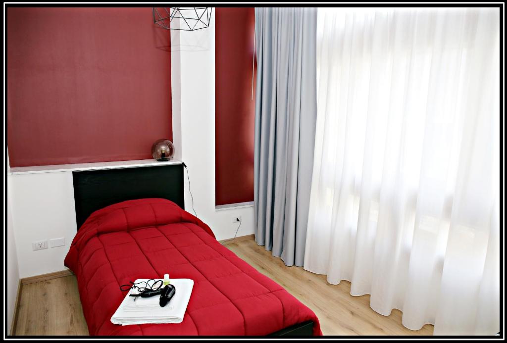 Posteľ alebo postele v izbe v ubytovaní Tosca B&B