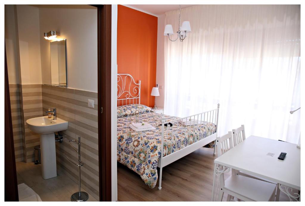 Posteľ alebo postele v izbe v ubytovaní Tosca B&B