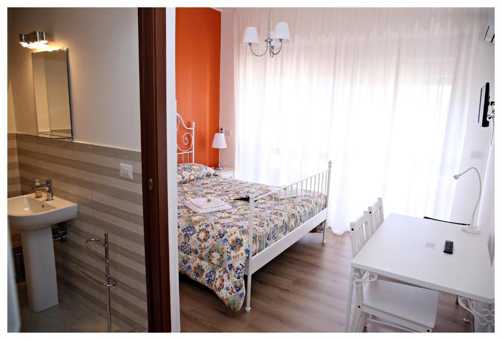 Posteľ alebo postele v izbe v ubytovaní Tosca B&B