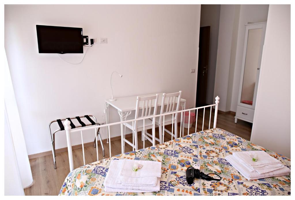 Posteľ alebo postele v izbe v ubytovaní Tosca B&B