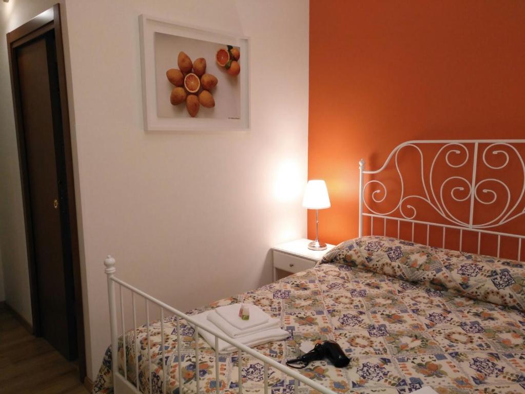Posteľ alebo postele v izbe v ubytovaní Tosca B&B