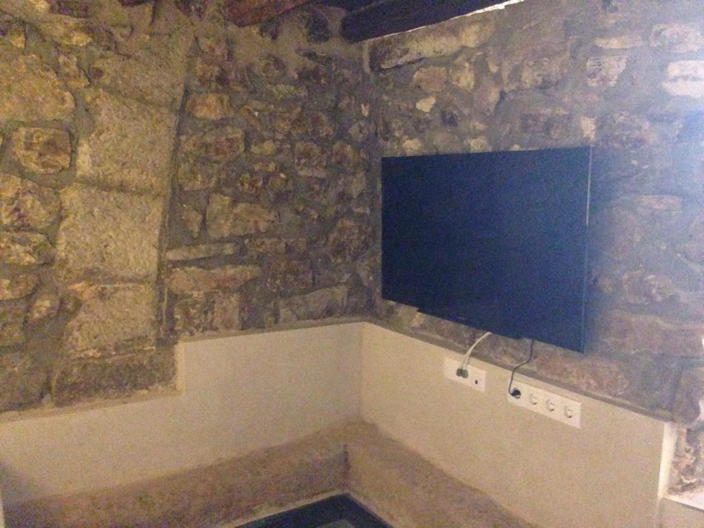 TV a/nebo společenská místnost v ubytování Cal Matiner Casa Rural ***