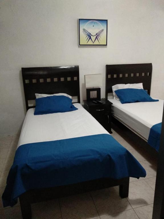 Letto o letti in una camera di Posada San Cristobal
