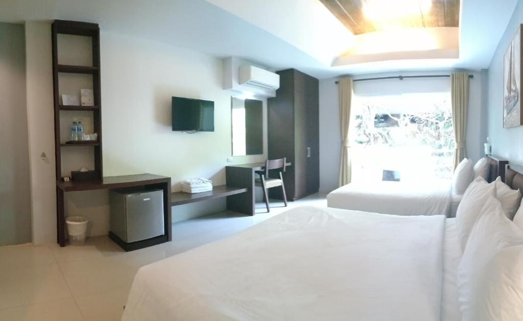 Postel nebo postele na pokoji v ubytování Aonang Eco Inn Krabi