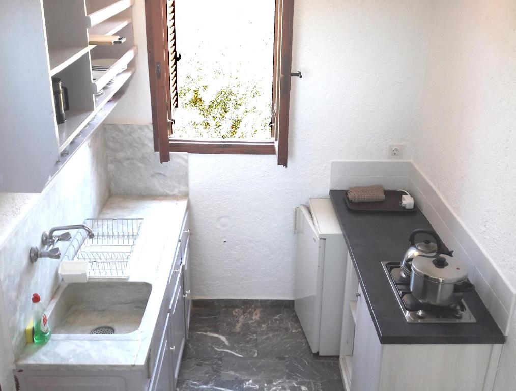 Kuchyň nebo kuchyňský kout v ubytování Elounda Island Villas