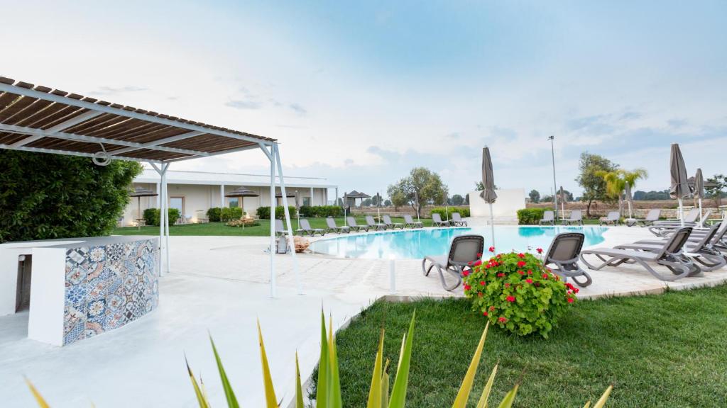 Bazén v ubytování Addauro Resort nebo v jeho okolí