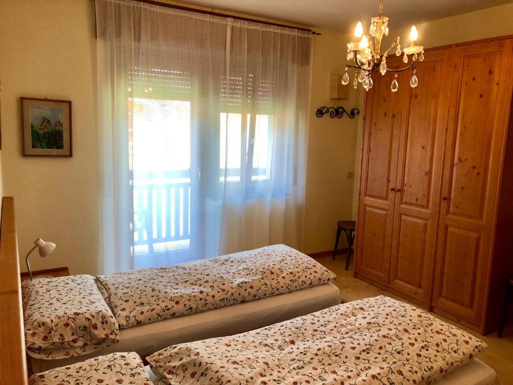 Postel nebo postele na pokoji v ubytování Stella Alpina