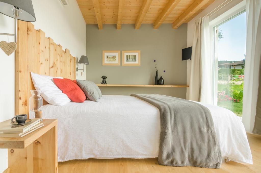 Postel nebo postele na pokoji v ubytování B&B Lupo