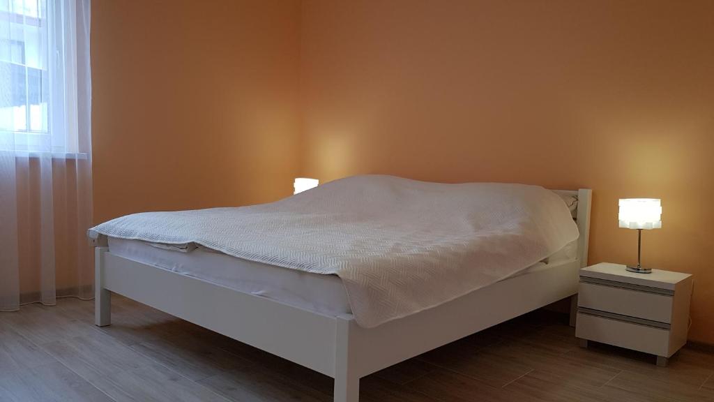 Postel nebo postele na pokoji v ubytování Arielle