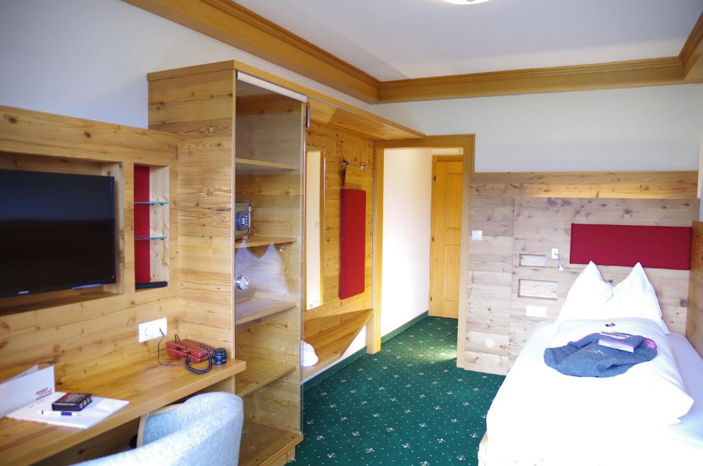Letto o letti in una camera di Hotel Berghof