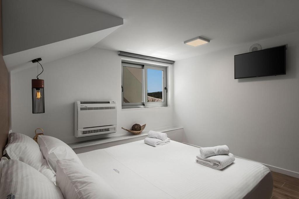 Posteľ alebo postele v izbe v ubytovaní Villa Sapphire