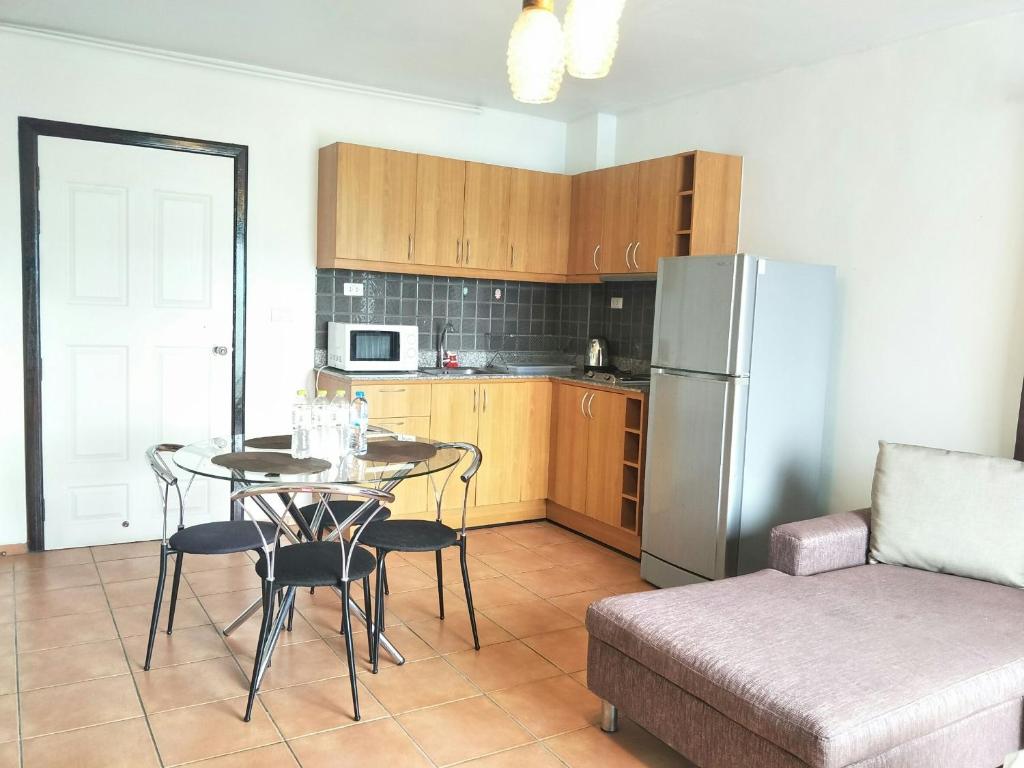 Kuchyň nebo kuchyňský kout v ubytování Lomsabai Apartments