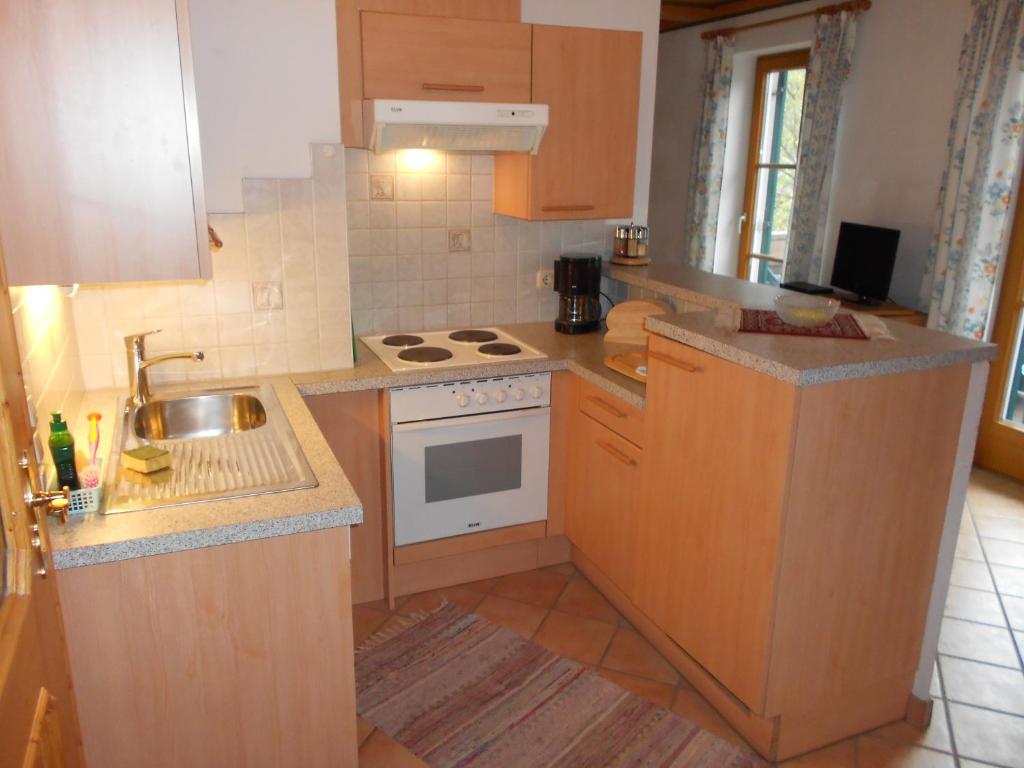 Kuchyň nebo kuchyňský kout v ubytování Ferienhaus Peer
