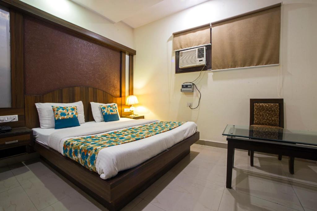 Postel nebo postele na pokoji v ubytování Hotel Baba Inn-By RCG Hotels
