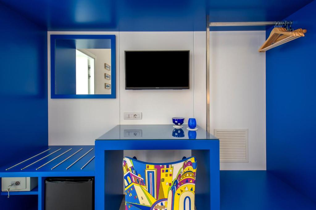TV a/nebo společenská místnost v ubytování Corte's House