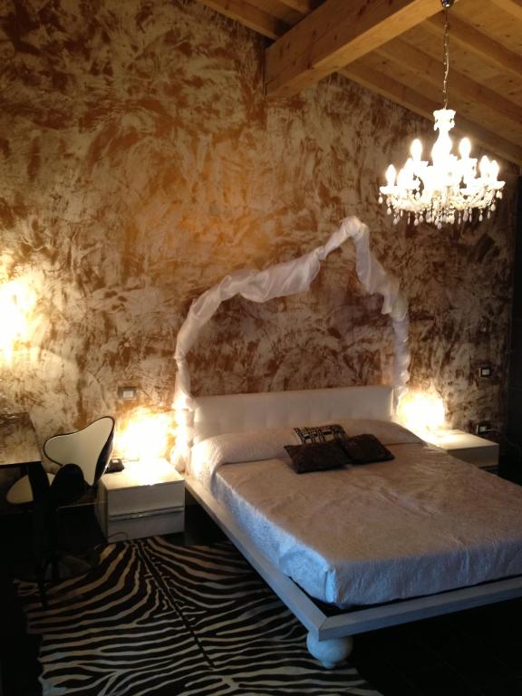 Postel nebo postele na pokoji v ubytování Hotel Baia dei Pini
