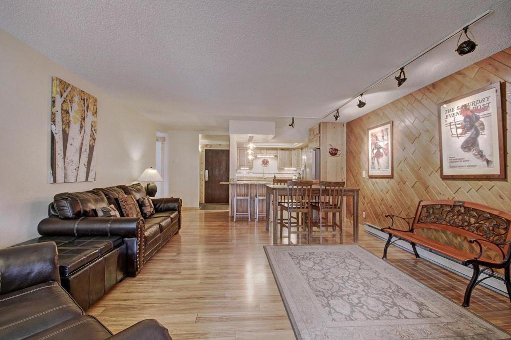 a living room with a couch and a table at BE108 Bridge End Condo in Copper Mountain