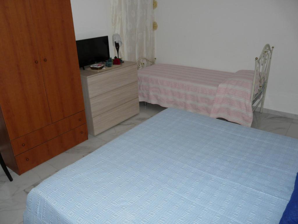 Postel nebo postele na pokoji v ubytování Villa Yucca