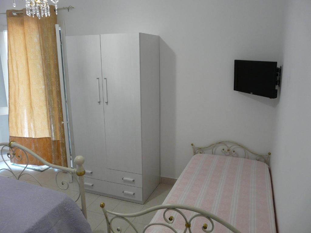 Postel nebo postele na pokoji v ubytování Villa Yucca