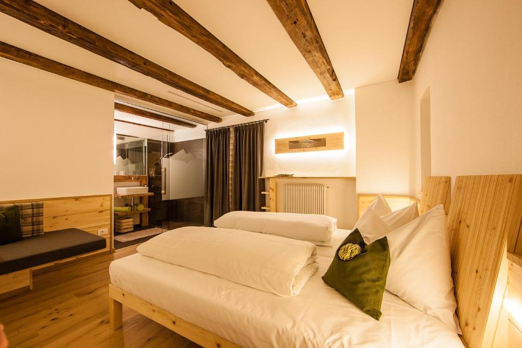 Lova arba lovos apgyvendinimo įstaigoje Hotel Restaurant Waldbichl