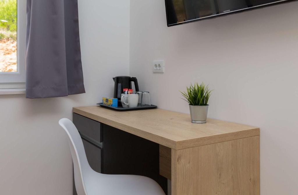 Příslušenství pro přípravu čaje a kávy v ubytování Villa Medak