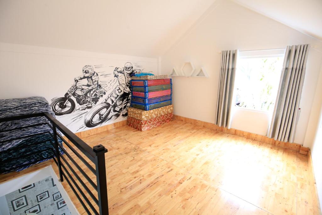 Postel nebo postele na pokoji v ubytování Zan HomeStay