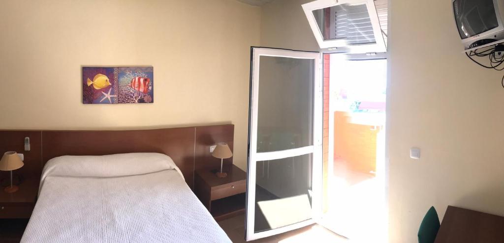 Postel nebo postele na pokoji v ubytování Albergue De Puntas De Calnegre
