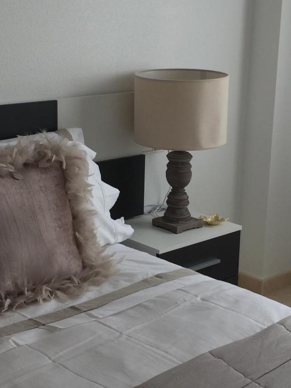 Posteľ alebo postele v izbe v ubytovaní Residential jardín del pintor - la casa amarilla
