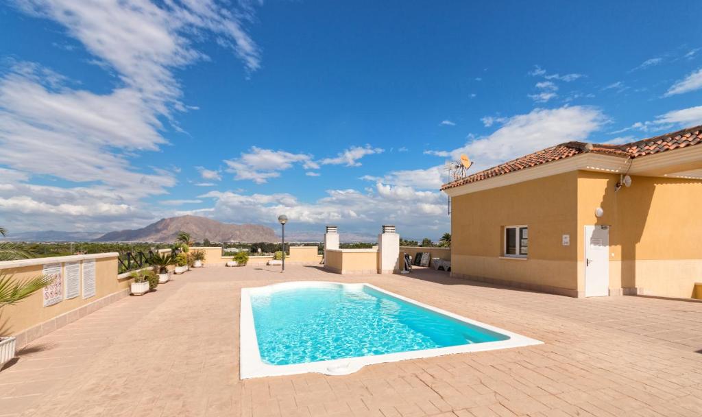 Bazén v ubytovaní Residential jardín del pintor - la casa amarilla alebo v jeho blízkosti