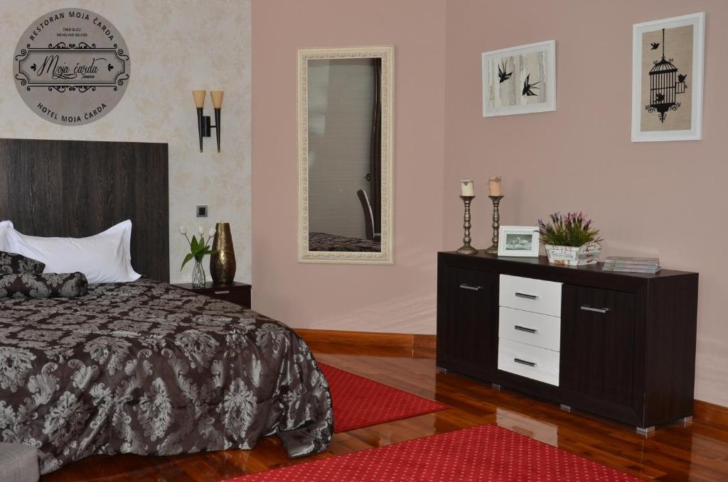 Postel nebo postele na pokoji v ubytování Hotel Moja Čarda