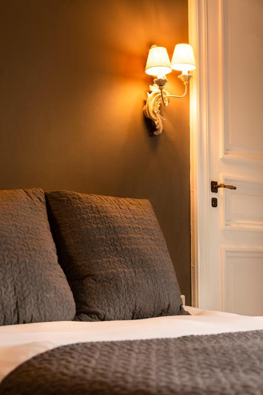 Postel nebo postele na pokoji v ubytování B&B 't Kasteel & 't Koetshuys