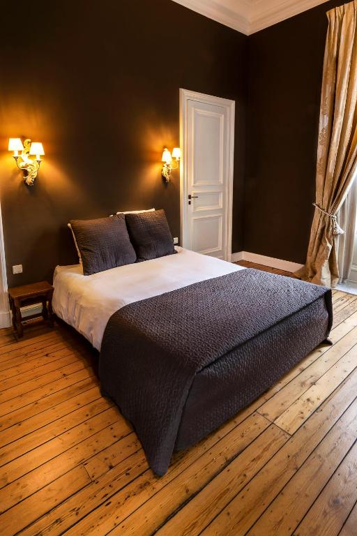 Postel nebo postele na pokoji v ubytování B&B 't Kasteel & 't Koetshuys