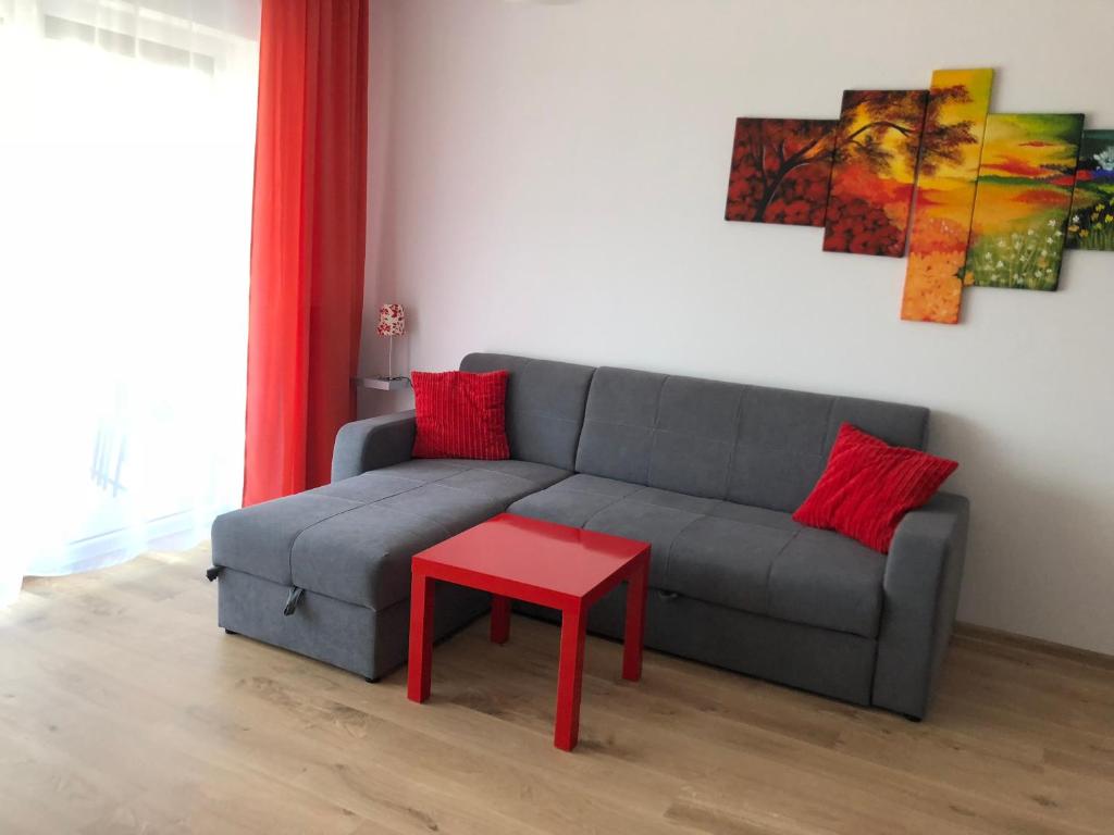 Część wypoczynkowa w obiekcie Apartament W KWIATKI:) Pogorzelica