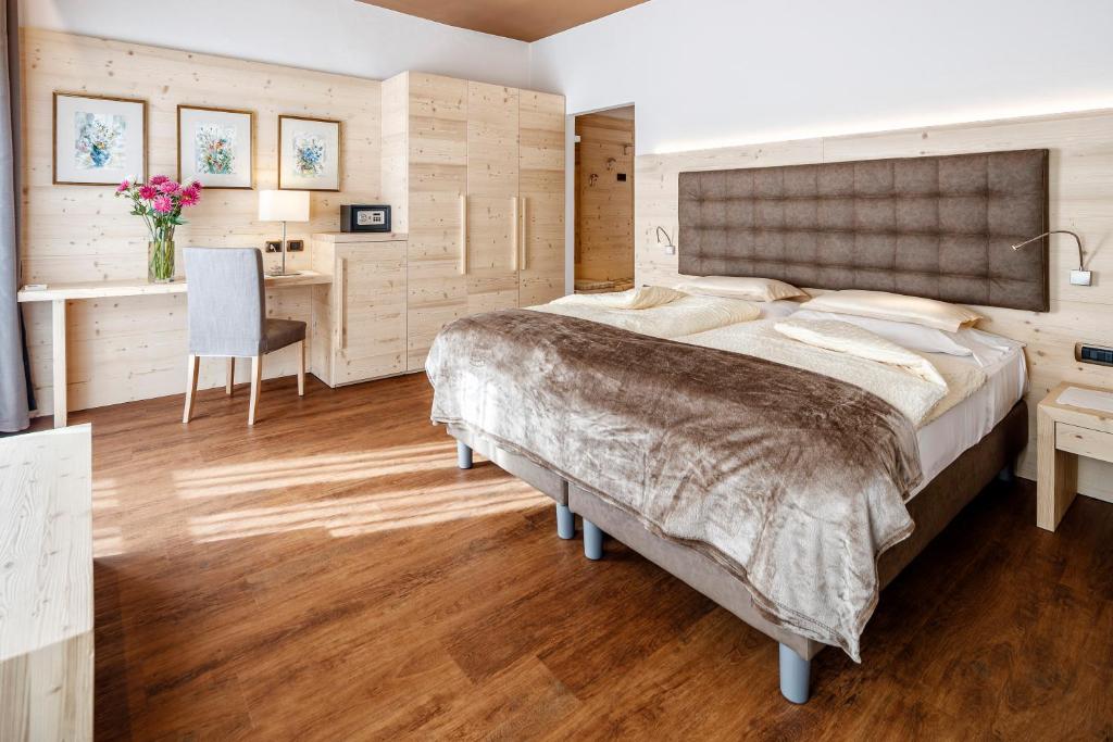 Кровать или кровати в номере Hotel Menardi