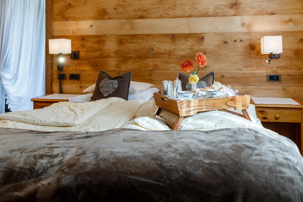 Кровать или кровати в номере Hotel Menardi