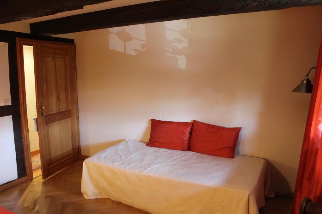 Postel nebo postele na pokoji v ubytování B&B La Tête dans les Etoiles