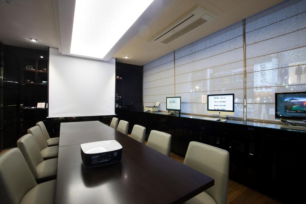 TV a/nebo společenská místnost v ubytování The Grand Hotel Myeongdong