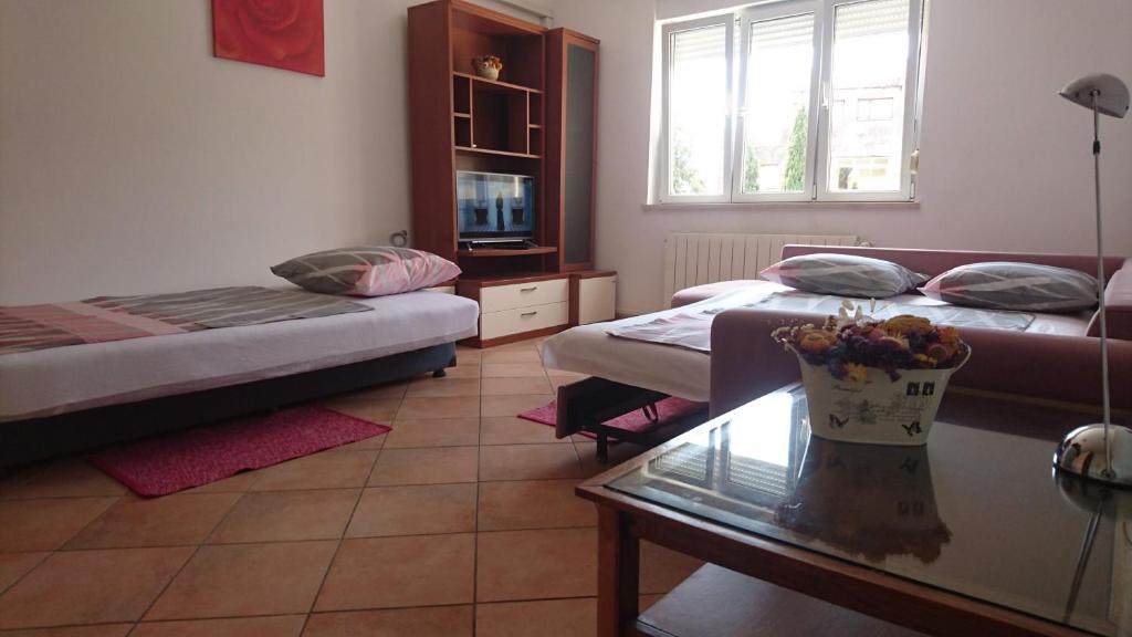 Postel nebo postele na pokoji v ubytování eco Apartment