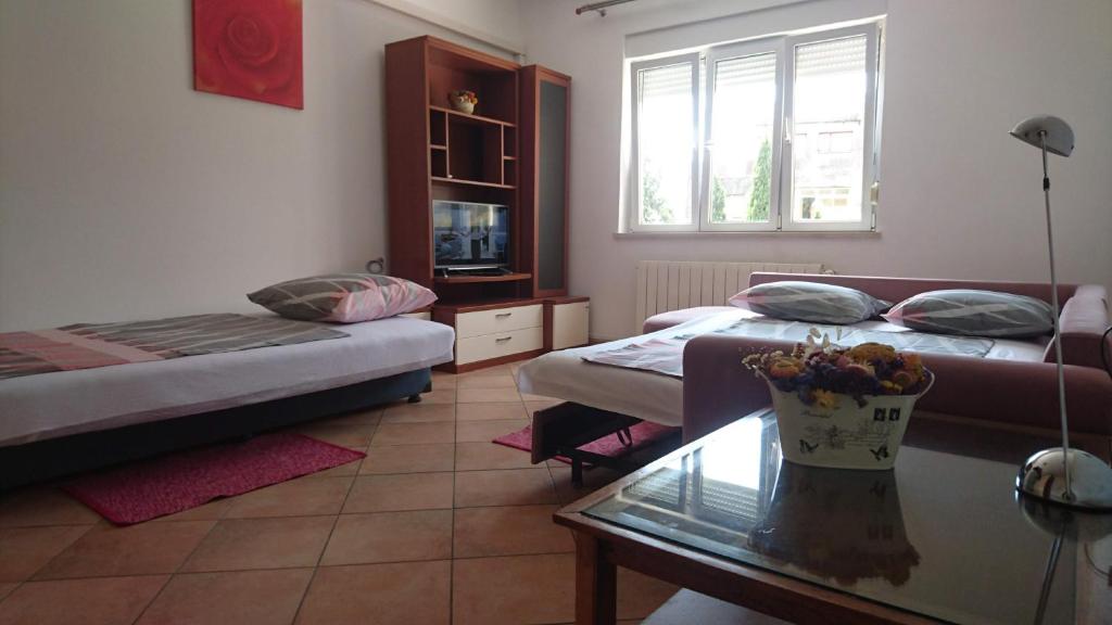 Postel nebo postele na pokoji v ubytování eco Apartment