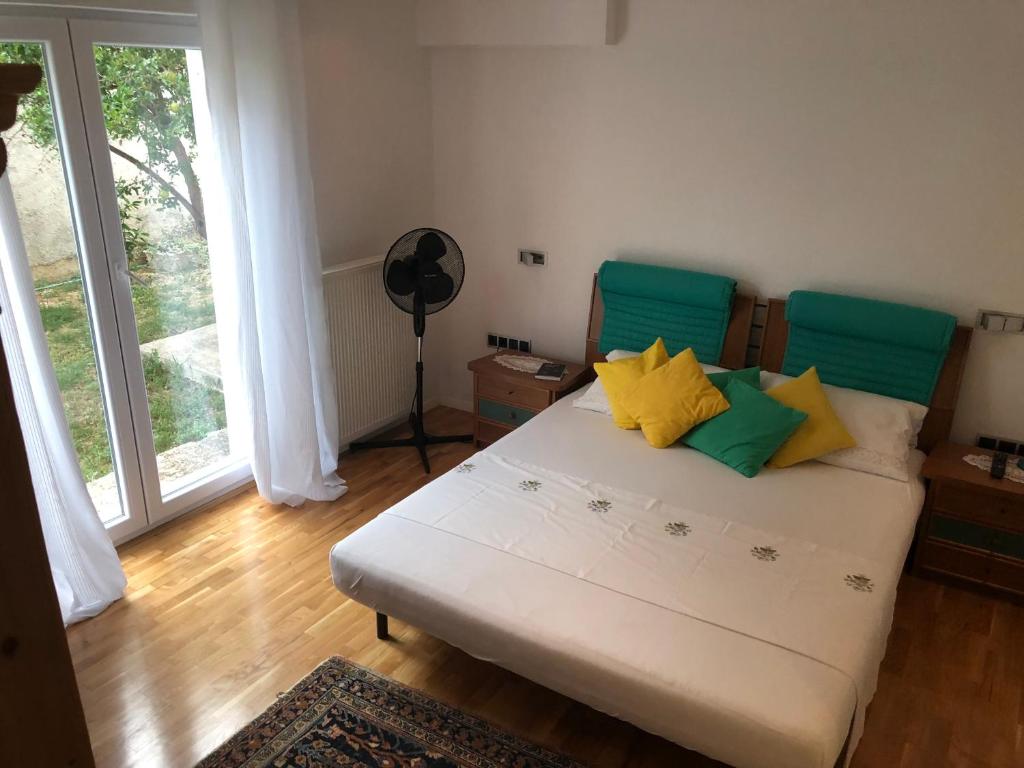 Ένα ή περισσότερα κρεβάτια σε δωμάτιο στο Zimmer Room Trogir Kastela Split