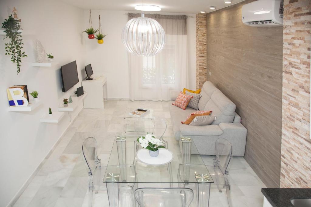 Televízia a/alebo spoločenská miestnosť v ubytovaní Málaga Peña Historical Centre Apartment