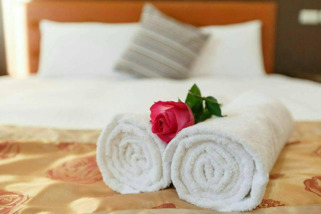 Postel nebo postele na pokoji v ubytování Kenting Mulan Homestay